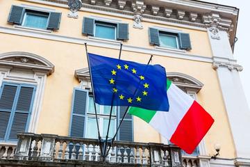 Italian and European union flags at building in Rome.